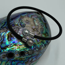 Load image into Gallery viewer, This open ended bracelet is made from Black Stainless steel mesh and is German made for quality and durability It features two Tahitian pearls, Circle drop in shape and 9mm in size Note the color of the pearls will vary due to natural variations