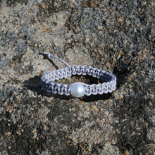 Load image into Gallery viewer, Thick Grey Macrame bracelet featuring an Australian South Sea Pearl, Circle Drop in shape, 10.3 mm in size, White in colour.  (J3319)  This bracelet is made from water and colorfast nylon material for heavy duty wear and tear, features no glue and no metal parts   
