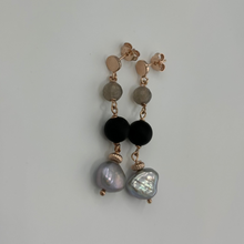 Load image into Gallery viewer, Make a statement with these 18K Rose gold plated over sterling silver stud style earrings. They feature three stunning elements - silver grey Freshwater Pearls, black agate and smokey quartz. Each element is highlighted with Rose gold links.
Pearls measure 10mm.
Total length from top to bottom is 50mm.