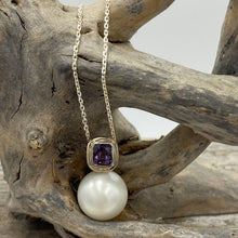 Load image into Gallery viewer, Australian south sea pearl pendant handcrafted 9ct white gold bezel set with a natural purple Spinel stone, 1.48ct in size and cushion cut. This pendant features a large Australian South Sea Broome origin pearl, 15mm in size, Round in shape, White in color with Good lustre and clean skin J3399