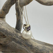 Load image into Gallery viewer, Australian south sea pearl pendant handcrafted 9ct white gold bezel set with a natural purple Spinel stone, 1.48ct in size and cushion cut. This pendant features a large Australian South Sea Broome origin pearl, 15mm in size, Round in shape, White in color with Good lustre and clean skin J3399