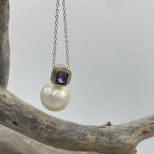 Load image into Gallery viewer, Australian south sea pearl pendant handcrafted 9ct white gold bezel set with a natural purple Spinel stone, 1.48ct in size and cushion cut. This pendant features a large Australian South Sea Broome origin pearl, 15mm in size, Round in shape, White in color with Good lustre and clean skin J3399