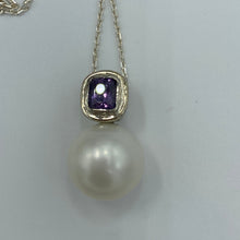 Load image into Gallery viewer, Australian south sea pearl pendant handcrafted 9ct white gold bezel set with a natural purple Spinel stone, 1.48ct in size and cushion cut. This pendant features a large Australian South Sea Broome origin pearl, 15mm in size, Round in shape, White in color with Good lustre and clean skin J3399