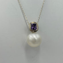 Load image into Gallery viewer, Australian south sea pearl pendant handcrafted 9ct white gold bezel set with a natural purple Spinel stone, 1.48ct in size and cushion cut. This pendant features a large Australian South Sea Broome origin pearl, 15mm in size, Round in shape, White in color with Good lustre and clean skin J3399