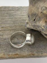 Load image into Gallery viewer, This solid 925 Sterling Silver Ring features a fully protected cup so the pearl is fully protected making this the perfect ring for heavy wear conditions. It features a White 12mm Button shaped Freshwater Pearl. Available in Sizes 7, 8 , 9, 10 and 11