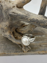 Load image into Gallery viewer, This solid 925 Sterling Silver Ring features a fully protected cup so the pearl is fully protected making this the perfect ring for heavy wear conditions. It features a White 12mm Button shaped Freshwater Pearl. Available in Sizes 7, 8 , 9, 10 and 11