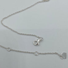 Load image into Gallery viewer, Sterling silver pendant and chain featuring a round bezel set reversible disc of Blue Paua shell on one side and White Mother of Pearl shell on the other side.
Disc size is 14mm in diameter and 2.5mm in thickness with an adjustable chain length from 39cm to 42cm