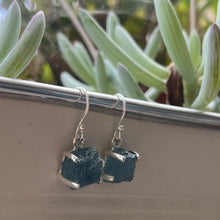 Load image into Gallery viewer, <p>Sterling silver claw set shepherds hook style earrings featuring stunning Rough cut Aquamarine gemstones</p> <p>The stones vary in shape but are roughly rectangle and 11 x 12mm in size</p> <p>Team your aquamarine earrings with an aquamarine necklace for a WOW effect</p>