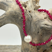 Load image into Gallery viewer, Australian South Sea pearl bracelet with 3mm faceted ruby gemstones and a sterling silver peanut clasp This stunning deep ruby red bracelet features a single White Australian South Sea pearl, button shape, 9.1mm in size, White with Pink hues in color. The length including the clasp is 19cm J3444