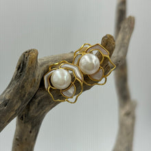 Load image into Gallery viewer, These 'Rose' earrings feature a beautiful filagree rose with central white 7.5mm button pearl and South Sea Mother of Pearl shell accents in the petals. They are set in 18ct gold plating over 925 sterling silver. The matching pendant is also available in yellow gold with an 18ct gold plating over 925 sterling silver also with an anti tarnish finish.