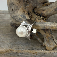 Load image into Gallery viewer, Concave Band Rim Set Ring features a Button Shape 9-10mm Freshwater Pearl, White in Colour.
This is a stunning ring and so comfortable to wear - the pearl is protected and the profile low so ideal for everyday wear
Available in sizes 54 (7 or N) ,56 (O1/2), 58 (8.5 or Q) and 60 (R1/2)