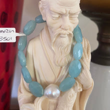 Load image into Gallery viewer, Stunning Amazonite bracelet featuring a white Australian South Sea Pearl
This Pearl is circle drop in shape, 12 x 13.5mm in size and white in colour
The Amazonite beads are flat oval facetted and are 10 x 16mm in size
This bracelet is easy to slip on and off as it's made on elastic
J3501