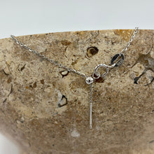 Load image into Gallery viewer, This versatile Slider necklace features a single Drop Baroque shape natural colour freshwater pearl, 10 x 12.5mm in size. It is the most stunning Chocolate with pink hues colour.
The chain is Sterling Silver and is adjustable up to 45cm using an easy pull tag .
It has protective silver hole covers to finish this off nicely and for protection and easy sliding