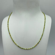 Load image into Gallery viewer, This earthy necklace features 2mm facetted Tree Turquoise beads , with a 925 sterling silver peanut clasp. It can be used as a necklace on it own or as a chain to hold a pendant. It is on 49 strand high strength US wire with scrimps for security Available in two finished length - either 39cm or 43cm