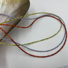 Load image into Gallery viewer, This earthy necklace features 2mm facetted Tree Turquoise beads , with a 925 sterling silver peanut clasp. It can be used as a necklace on it own or as a chain to hold a pendant. It is on 49 strand high strength US wire with scrimps for security Available in two finished length - either 39cm or 43cm