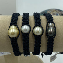 Load image into Gallery viewer, Macrame bracelet (thick thread black) featuring an Australian South Sea Pearl, Button in shape, 11.3mm in size, Champagne in colour. (J3320) This bracelet is made from water and colorfast nylon material for heavy duty wear and tear, features no glue and no metal parts Pictured second from right in group photo