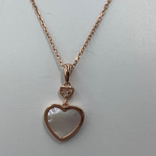 Load image into Gallery viewer, Our 'Beloved' pendant is 18K rose gold-plated sterling 925 silver earrings with elegant mother-of-pearl. The stunning heart shape Mother of Pearl shell glistens in the light and is highlighted by the sparkle of the cubic zirconia above
Chain length is adjustable at either 40cm or 45cm
The pendant itself measures 20mm from the top to bottom.