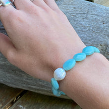 Load image into Gallery viewer, <p>Stunning Amazonite bracelet featuring a white Australian South Sea Pearl</p> <p>Pearl is circle drop in shape, and is 11.2 x 12.5mm in size and white in colour</p> <p>The Amazonite beads are flat oval facetted and are 10 x 16mm in size</p> <p>This bracelet is easy to slip on and off as it's made on elastic</p> <p>J3360</p>