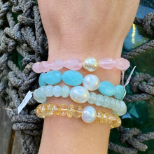 Load image into Gallery viewer, <p>Stunning Amazonite bracelet featuring a white Australian South Sea Pearl</p> <p>Pearl is circle drop in shape, and is 11.2 x 12.5mm in size and white in colour</p> <p>The Amazonite beads are flat oval facetted and are 10 x 16mm in size</p> <p>This bracelet is easy to slip on and off as it's made on elastic</p> <p>J3360</p>