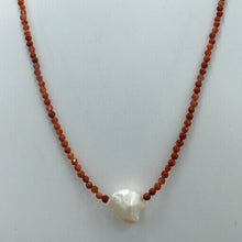 Load image into Gallery viewer, &lt;p&gt;&lt;span&gt;This necklace features a white Freshwater Keshi or seedless Pearl&nbsp; on a necklace of 2.5mm facetted Red Bamboo Coral gemstones with a sterling silver peanut clasp&lt;/span&gt;&lt;/p&gt; &lt;p&gt;&lt;span&gt;The pearl is 11 x 12mm in size&lt;/span&gt;&lt;/p&gt; &lt;p&gt;The overall length is 45cm&lt;/p&gt; &lt;p&gt;Other gemstone necklaces can be made to order&lt;/p&gt;
