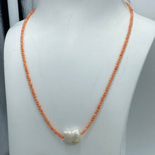 Load image into Gallery viewer, <p><span>This necklace features a white Freshwater Keshi or seedless Pearl on a necklace of 2.5mm facetted Orange Bamboo Coral gemstones with a sterling silver peanut clasp</span></p> <p><span>The pearl is 12.5 x 15mm in size</span></p> <p>The overall length is 46cm</p> <p>Other gemstone necklaces can be made to order</p>