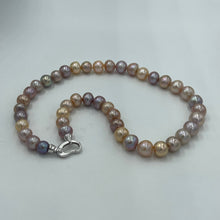 Load image into Gallery viewer, &lt;p&gt;Freshwater Edison pearl strand featuring natural multicolour pearls, natural shades of Pink through to Lavender round shaped pearls, 10 - 11mm in size, with a Sterling Silver clasp.&lt;/p&gt; &lt;p&gt;45cm in length&lt;/p&gt; &lt;p&gt;Matching bracelet available featuring an identical clasp - these can be joined together to make a 65cm strand&lt;/p&gt; &lt;p&gt;INS&lt;/p&gt;
