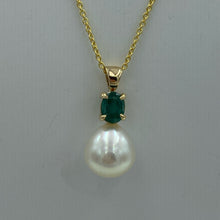 Load image into Gallery viewer, Elegant Emerald pendant featuring a beautiful Pink White Australian pearl, Circle Drop in shape, 13.2mm in size and high lustre This pendant features and Oval shape facetted natural Emerald which is claw set in a 9ct yellow gold hand crafted pendant J3390