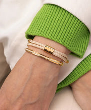 Load image into Gallery viewer, Stunning new range of Ladies Stainless steel and nautical rope jewellery, hand made in Amsterdam and designed with strength to be worn 24/7
This closed cuff is 4mm wide with a 1.4mm rope insert.
In stock now size S/M
Also available in other colors and sizes
Mix and match or stack with other bracelets like the Little Lewis in the photo here