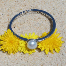 Load image into Gallery viewer, Sterling Silver solid bangle featuring an Australian South Sea Pearl This stunning pearl is an Australian South Sea pearl, Button in shape and 14.3mm in size. It is White with Silver Pink hues and is featured on this rhodiun coated non tarnish bangle J3293