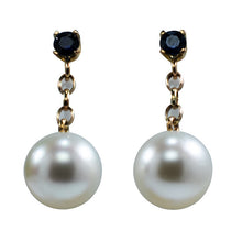 Load image into Gallery viewer, Stunning handcrafted 9ct yellow gold earrings featuring studs of Blue sapphires, 4mm round and claw set. Under this is 9ct chain joining to our highest grade White South Sea Pearls. They are 11.4mm, Round in shape White with pink hues, AAA grade lustre and skin