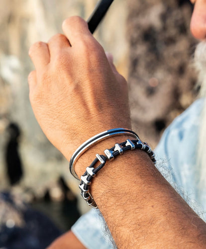 Stunning new range of Men's Stainless steel and nautical rope jewellery, hand made in Amsterdam and designed with strength to be worn 24/7

Silver  6mm cuff with 2mm flat navy rope

In stock now size M/L

Pictured below with 'Bold Bob' and 