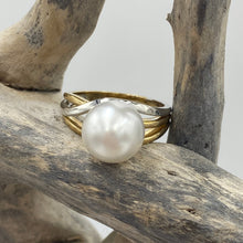 Load image into Gallery viewer, Lucinda is our stunning Australian South Sea pearl ring This ring is set in a two tone setting of 9ct White Gold and 9ct Yellow Gold.  It features a Round shape pearl, 10.3mm in size and White with a Silver hues in color, AAA grade  Size N (54)  J3100
