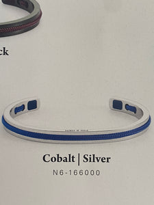 Stunning new range of Men's Stainless steel and nautical rope jewellery, hand made in Amsterdam and designed with strength to be worn 24/7

Silver&nbsp; 6mm cuff with 2mm flat cobalt blue rope

In stock now size M

Pictured below with 'Little Lewis Cobalt"

Also available in other colors and sizes&nbsp;