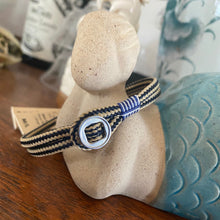 Load image into Gallery viewer, Stunning new range of Men&#39;s Stainless steel and nautical rope jewellery, hand made in Amsterdam and designed with strength to be worn 24/7

Navy and Sand 3mm rope with Silver 3mm Button

In stock now size ML

Also available in other colors and sizes&nbsp;
