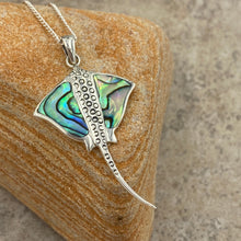 Load image into Gallery viewer, Sterling Silver Pendant features green blue NZ Paua&nbsp; shell in the shape of a Manta Ray and textured up the middle.

It is 25mm across and 50mm from top to bottom of the tail

Price includes Base Metal chain.
