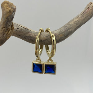 Sterling Silver and gold plated 'Huggie' Earrings featuring bezel set rectangle Blue Cubic Zirconia

Size is 22mm from top to bottom