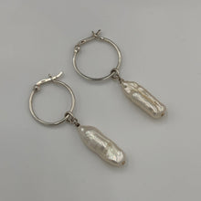 Load image into Gallery viewer, These stunning Biwa pearl earrings feature white drop Biwa pearls on 925 sterling silver hoop earrings.

The pearls measure 23mm x 7mm.

They are detachable and the pearls can be taken off the hoops and interchanged
