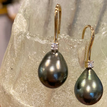 Load image into Gallery viewer, Our &#39;Lucia&#39; earrings are 9ct Yellow Gold and diamond with  stunning Drop shaped Tahitian South Sea Pearls.  They  feature a single bezel set diamond in each with a Total Diamond Weight of 2= 0.117ct  and HSI quality   The pearls are tear drop in shape and 10.8 x 13.9mm in size and is a stunning Peacock Green in color with strong Aubergine hues and High lustre  There is a matching &#39;Lucia&#39; pendant if you search Lucia  J3216
