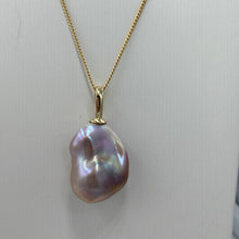 Load image into Gallery viewer, &#39;Kitzu&#39; is a stunning large&nbsp; Baroque Freshwater Edison Pearl set in a 9ct yellow&nbsp; Gold pendant which can be worn on any chain.

This large pearl is 18 mm wide and&nbsp; 25mm high with&nbsp; beautiful lustre and a deep natural lavender and pink coloration
