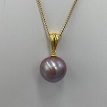 Load image into Gallery viewer, &#39;Kate&#39; is a stunning large Round Freshwater Edison Pearl set on a 9ct yellow gold pendant

This large Round pearl is 13.8 mm in size with high lustre and the most stunning natural lavender color&nbsp;
