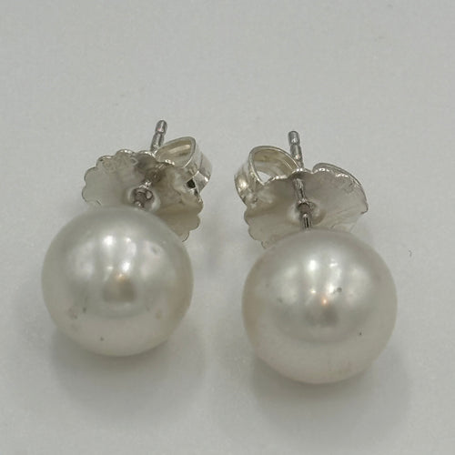 Australian South sea pearl studs set in 925 sterling silver  with extra large butterflies These earrings feature 10.2mm, Round pearls, AA grade with high lustre and light natural 'birthmarks'  White in color  J3418