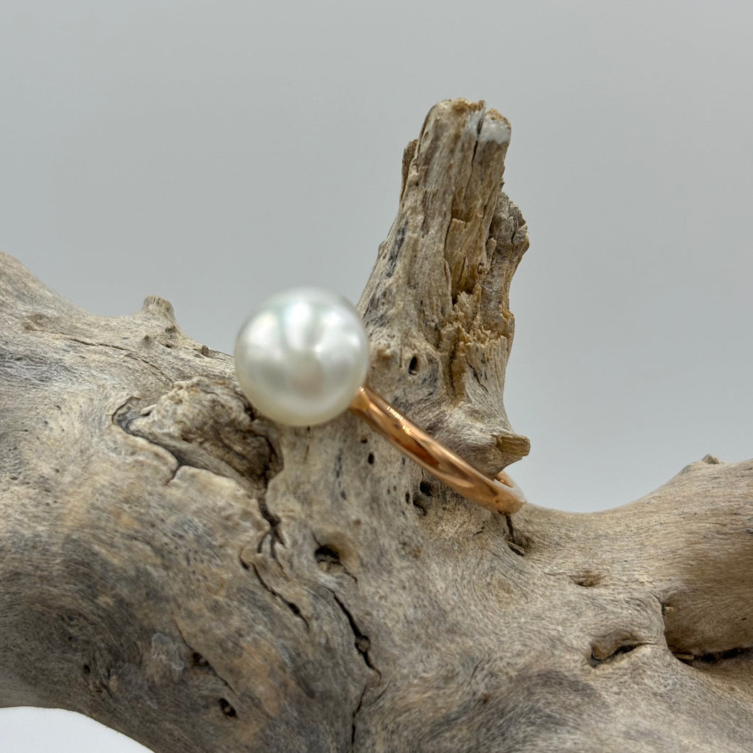 Australian natural South Sea 'Keshi' seedless pearl ring. This ring is set in 9ct Rose gold featuring a Button shape natural  'Keshi' pearl, 9.3mm in size, white with pink hues in colour.   J3411