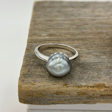 Load image into Gallery viewer, This ring features a Tahitian South Sea Pearl set in&nbsp;925 sterling silver and rhodium coated for a non tarnish finish.  This beautiful Blue pearl is an unusual Baroque Button shape and 10.7mm x 11.2mm in size.  Size P/ 57  J3438
