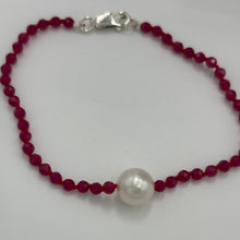 Load image into Gallery viewer, Australian South Sea pearl bracelet with 3mm faceted ruby gemstones and a sterling silver peanut clasp  This stunning deep ruby red bracelet features a single White Australian South Sea pearl, button shape,&nbsp; 9.4mm in size, White in color, with light natural &#39;birthmarks&#39;  The length including the clasp is 19cm  J3445
