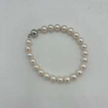 Load image into Gallery viewer, Stunning Akoya pearl strand bracelet, high lustre, and white with pink hues in color  This bracelet features twenty three round pearls, 7mm- 7.5mm,&nbsp; with a 9ct white gold traditional ball clasp.  It is 19cm including the clasp  J3396
