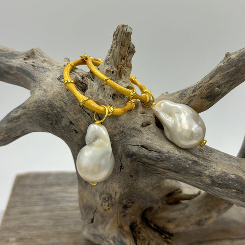 18K gold plated over 925 sterling silver hoop style earrings.  Satin finish earrings featuring Bamboo look and detachable large 14 x25mm, Baroque white Freshwater pearls.  Also available in Silver.