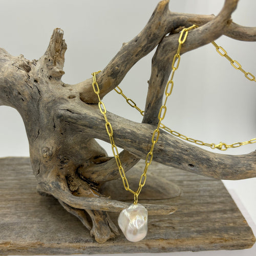 A fabulous White 18 x 24mm baroque Fresh Water Pearl pendant necklace in 18ct yellow gold plated over 925 sterling silver chain.  The overall length is 44cm and can be shortened  This necklace is also available in Sterling Silver.