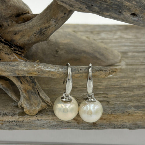 925 Sterling Silver articulated hook style earrings featuring large 12mm Round White Edison pearls. Big , bold and beautiful yet classic at the same time.