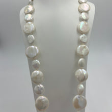 Load image into Gallery viewer, This exceptional quality Long White seedless Coin Freshwater pearl strand features a mix of 15mm and 21mm pearls of high lustre and white with cream hues in color.  It is fully knotted with a strong 10mm magnetic&nbsp; Gold Plated sterling silver clasp.&nbsp;  The length including clasp is 72cm.  SH469
