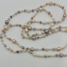 Load image into Gallery viewer, This elegant and versatile necklace is 1.2m long and can be worn in many ways.  It features mixed pearls of natural color and shapes,&nbsp; ranging in size from 3 to 8mm.  The colors range from white, pink and lavender.
